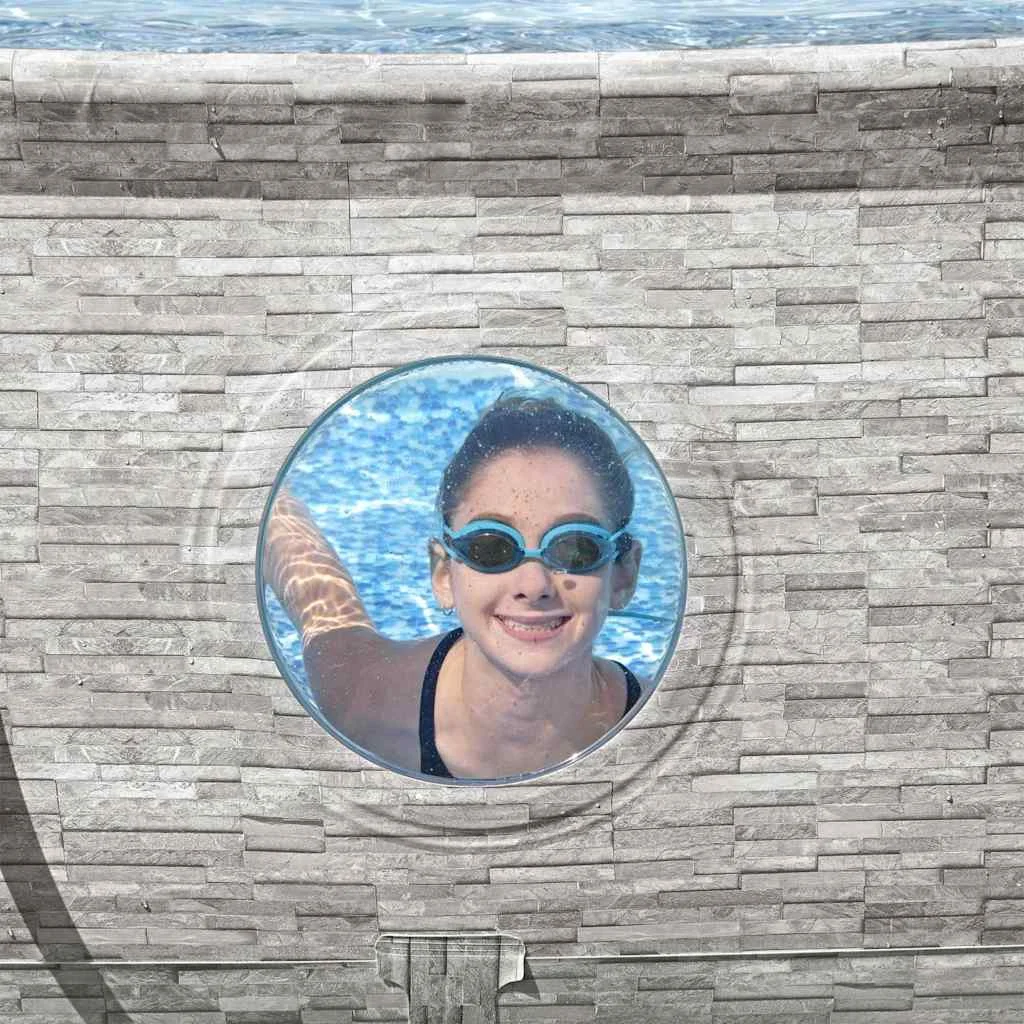 Piscine tubulaire ovale 488 x 305 x 107 cm effet pierre avec hublots et pompe – vue de détail